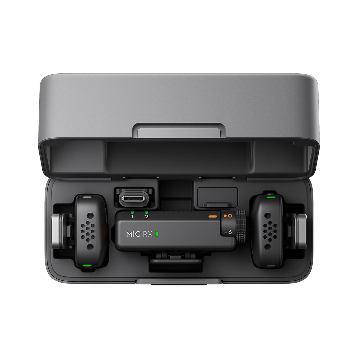 DJI Mic Mini charging case open showing transmitters and receiver
